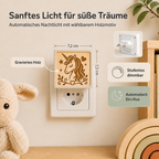 Steckdosen-Nachtlicht mit gravierter Holzfront und Einhornmotiv, warmem Licht und Dämmerungssensor.